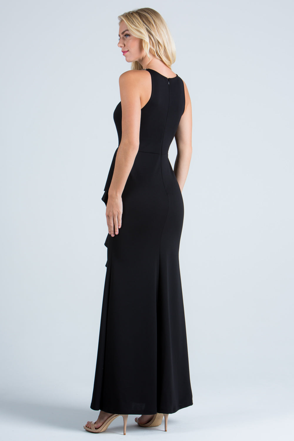 Embellished neck and ruffle detailed crepe gown.