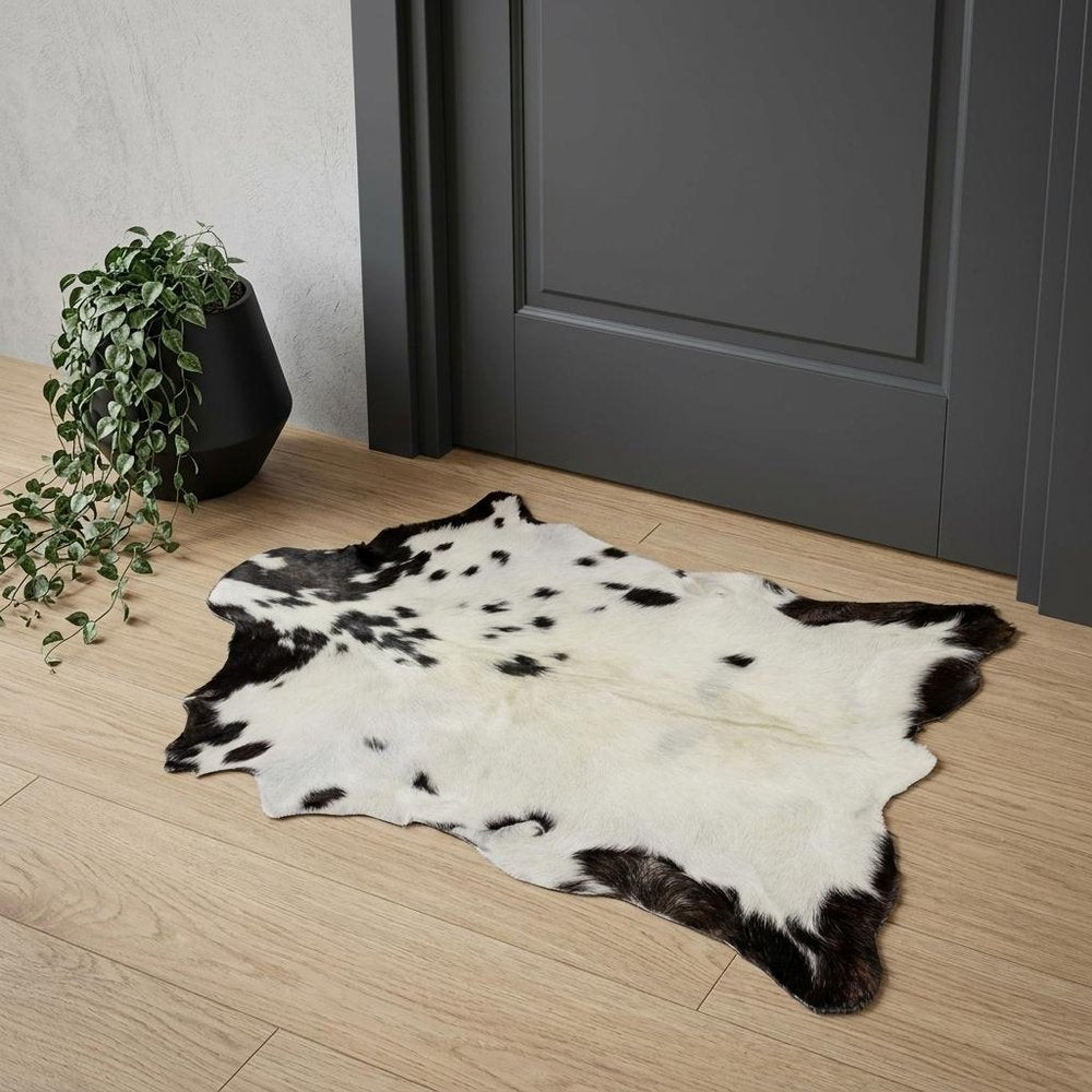 2' X 3' Black And White Cowhide Cowhide Print Hand Woven Area Rug