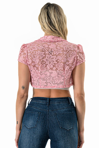 Crochet lace cropped shrug with open front and cap sleeves.