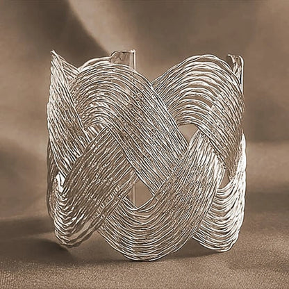 ROMANCE The Interlocking Waves Bracelet