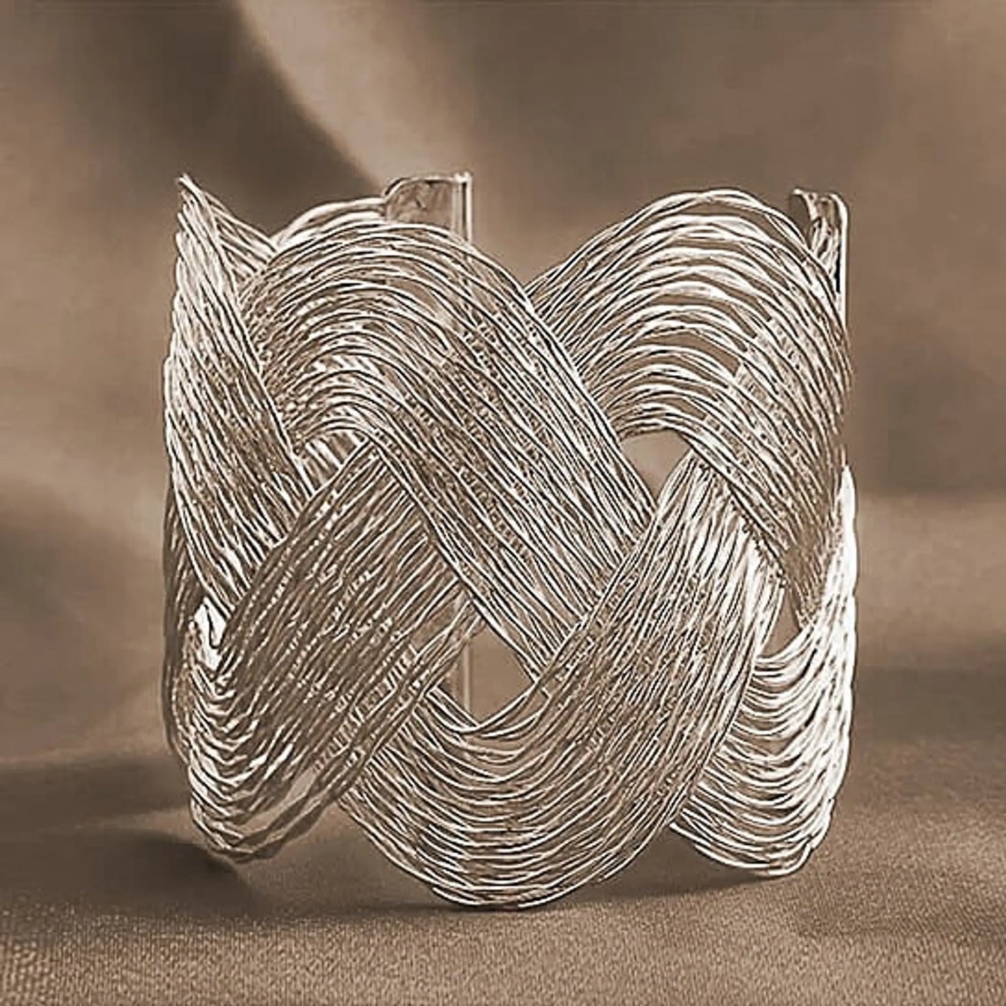ROMANCE The Interlocking Waves Bracelet
