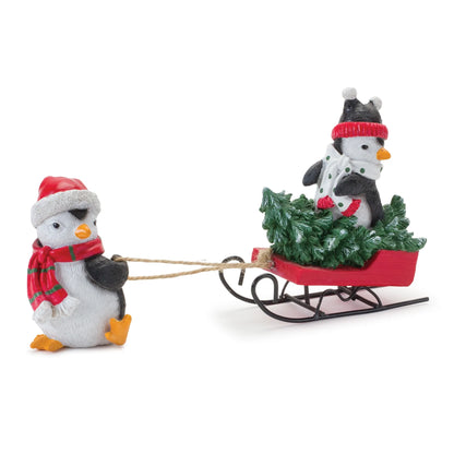 Playful Penguins with Sled Figurine