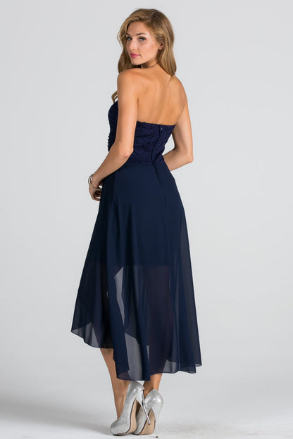 Open back Lace and chiffon surplus dress with waist brooch.