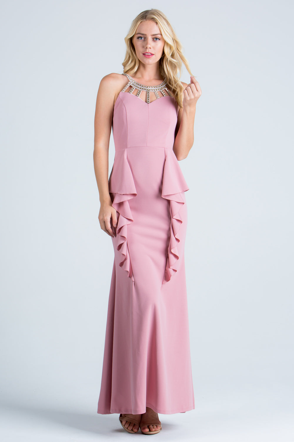 Embellished neck and ruffle detailed crepe gown.