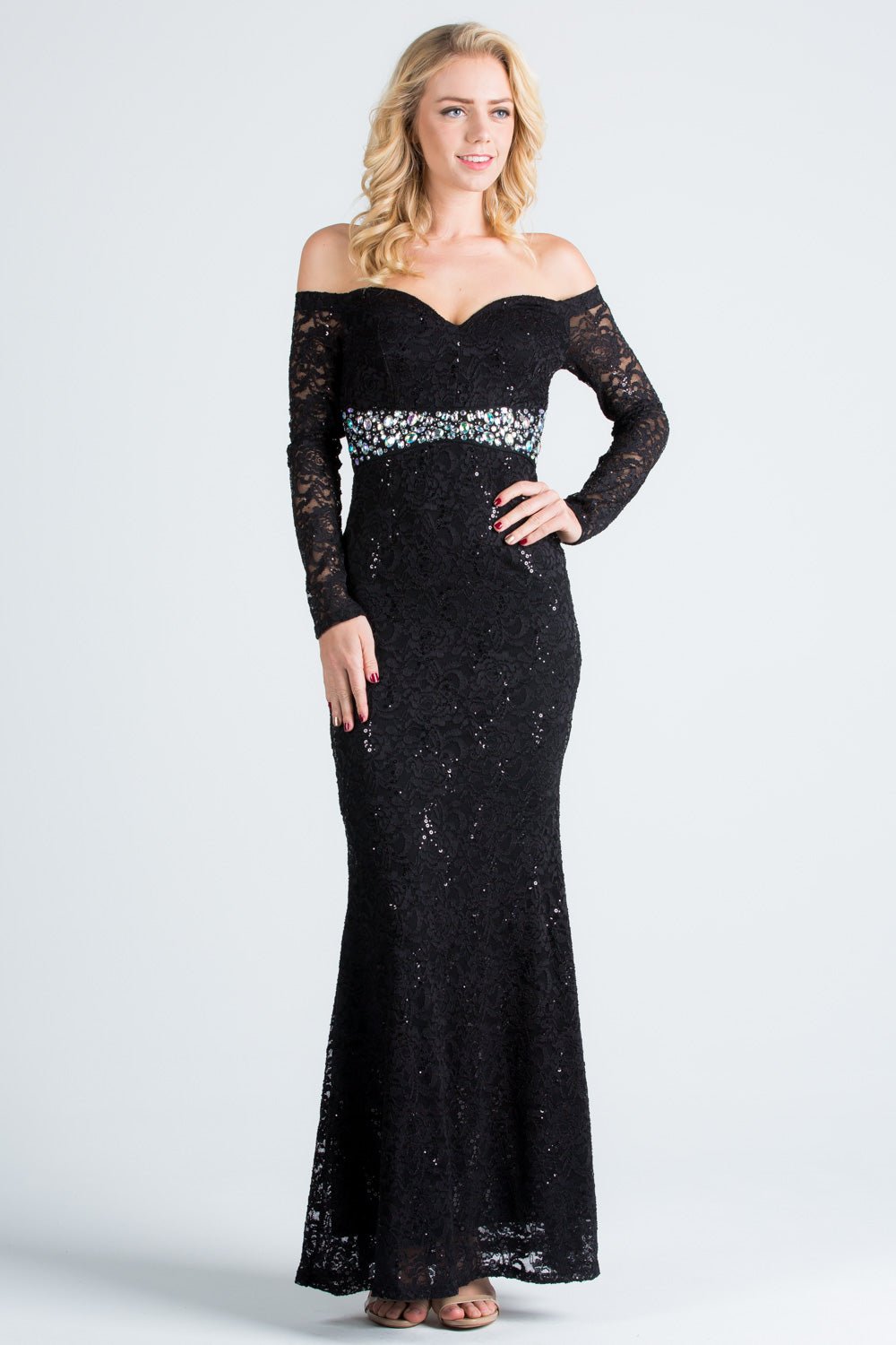 Off the shoulder long sleeve sweetheart sequin lace gown with waist embellishment.