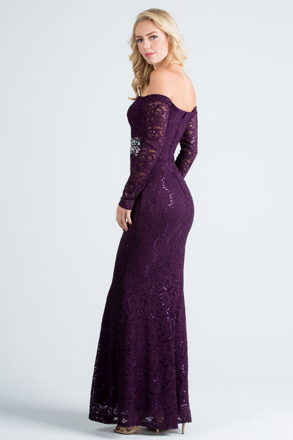 Off the shoulder long sleeve sweetheart sequin lace gown with waist embellishment.