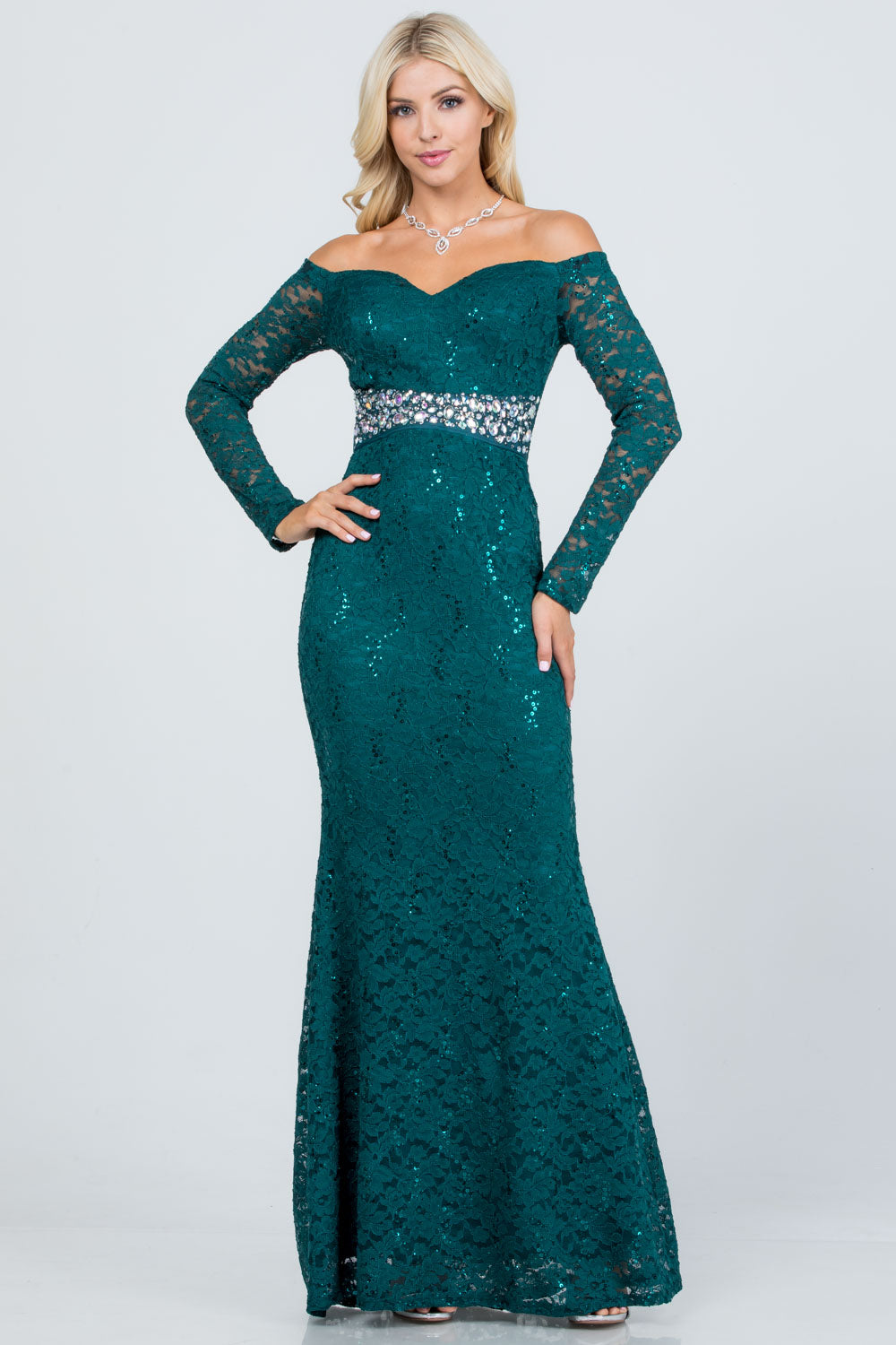 Off the shoulder long sleeve sweetheart sequin lace gown with waist embellishment.