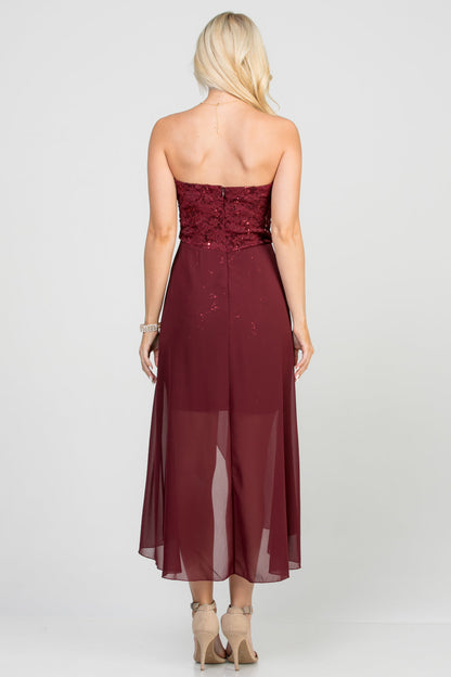 Open back Lace and chiffon surplus dress with waist brooch.