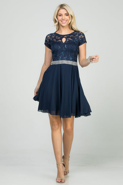Lace and wool dobby, cap sleeve, fit and flare dress with waist embellishment.