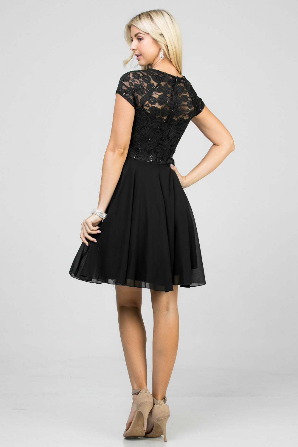 Lace and wool dobby, cap sleeve, fit and flare dress with waist embellishment.