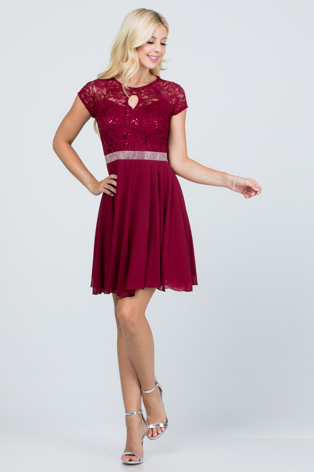 Lace and wool dobby, cap sleeve, fit and flare dress with waist embellishment.