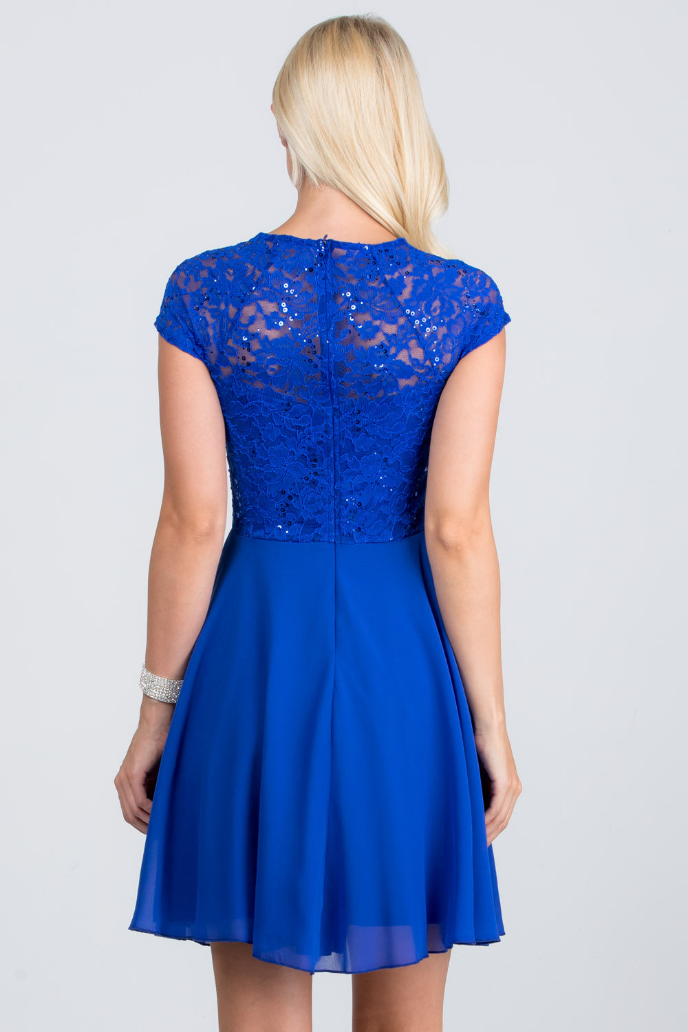 Lace and wool dobby, cap sleeve, fit and flare dress with waist embellishment.