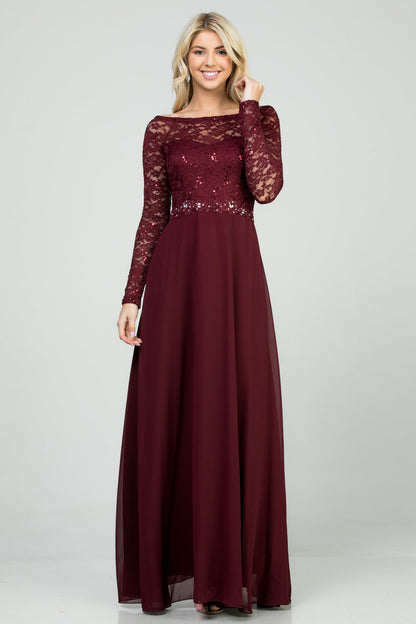 Long sleeve lace and chiffon A-line gown with waist lace embellishment.