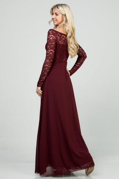 Long sleeve lace and chiffon A-line gown with waist lace embellishment.