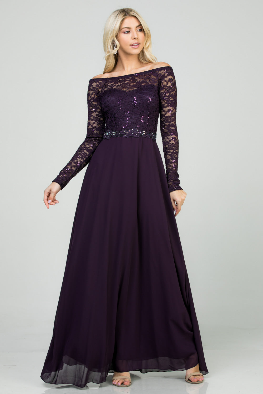 Long sleeve lace and chiffon A-line gown with waist lace embellishment.