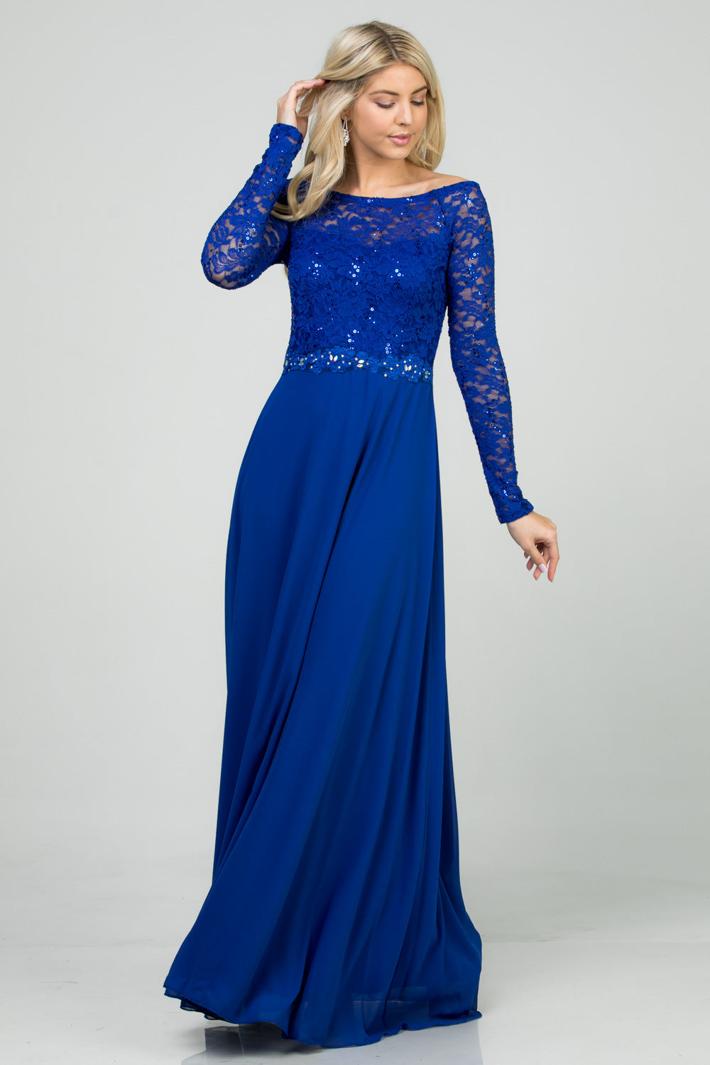 Long sleeve lace and chiffon A-line gown with waist lace embellishment.
