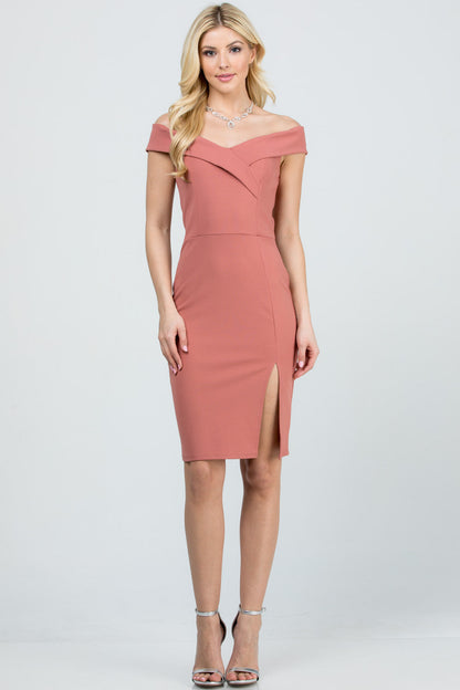 Off the shoulder cross front solid scuba crepe side slit pencil dress.