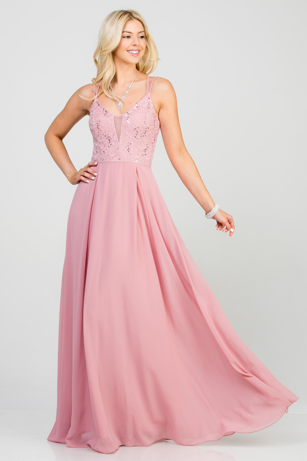 Full length double spaghetti strap sequin lace and chiffon dress with mesh insert on the front. Young contemporary for prom, homecoming graduation or cocktail events