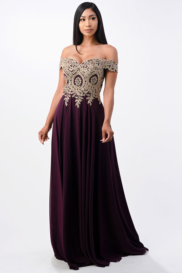 Off the shoulder chiffon gown embellished with gold lace appliques