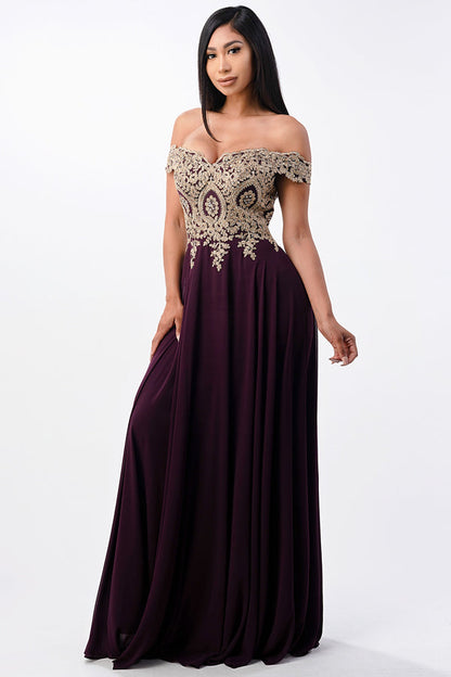 Off the shoulder chiffon gown embellished with gold lace appliques