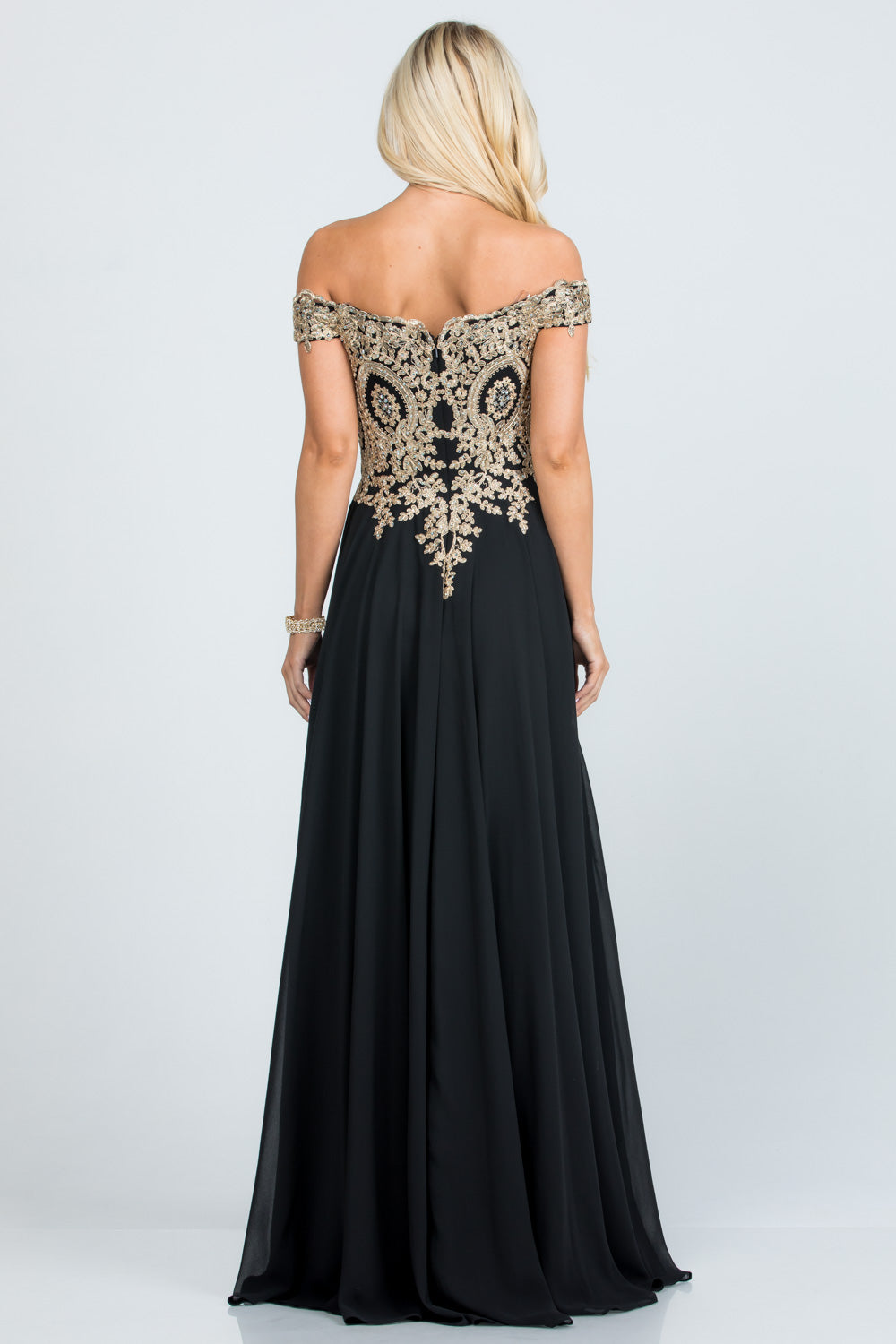 Off the shoulder chiffon gown embellished with gold lace appliques