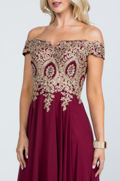 Off the shoulder chiffon gown embellished with gold lace appliques