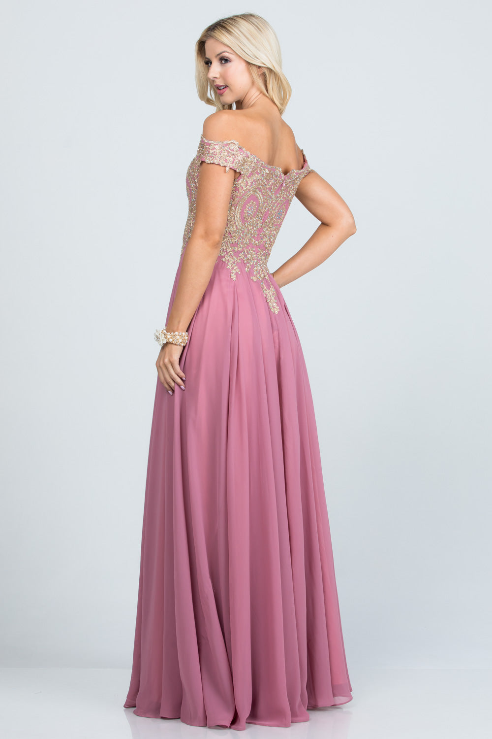 Off the shoulder chiffon gown embellished with gold lace appliques