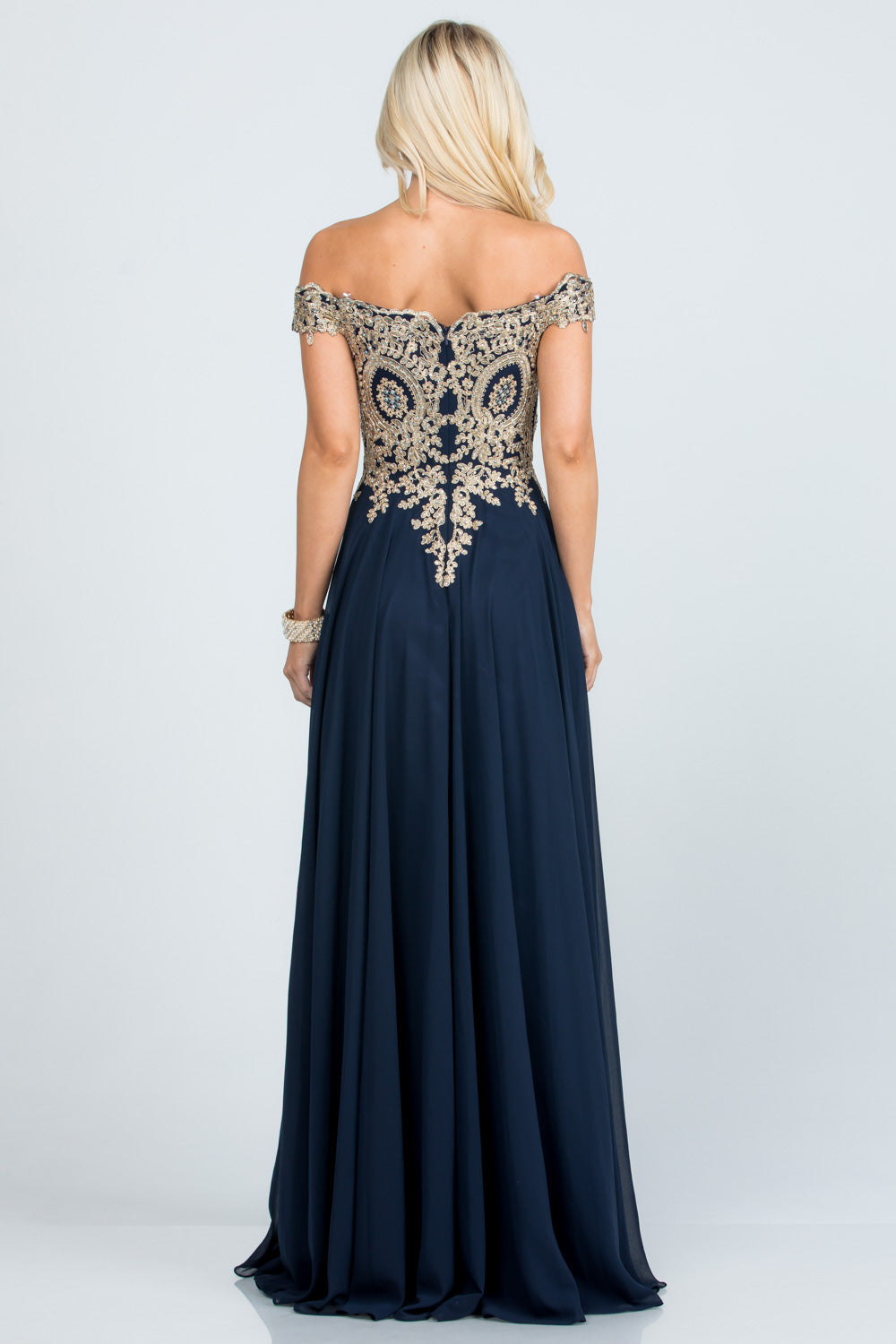 Off the shoulder chiffon gown embellished with gold lace appliques