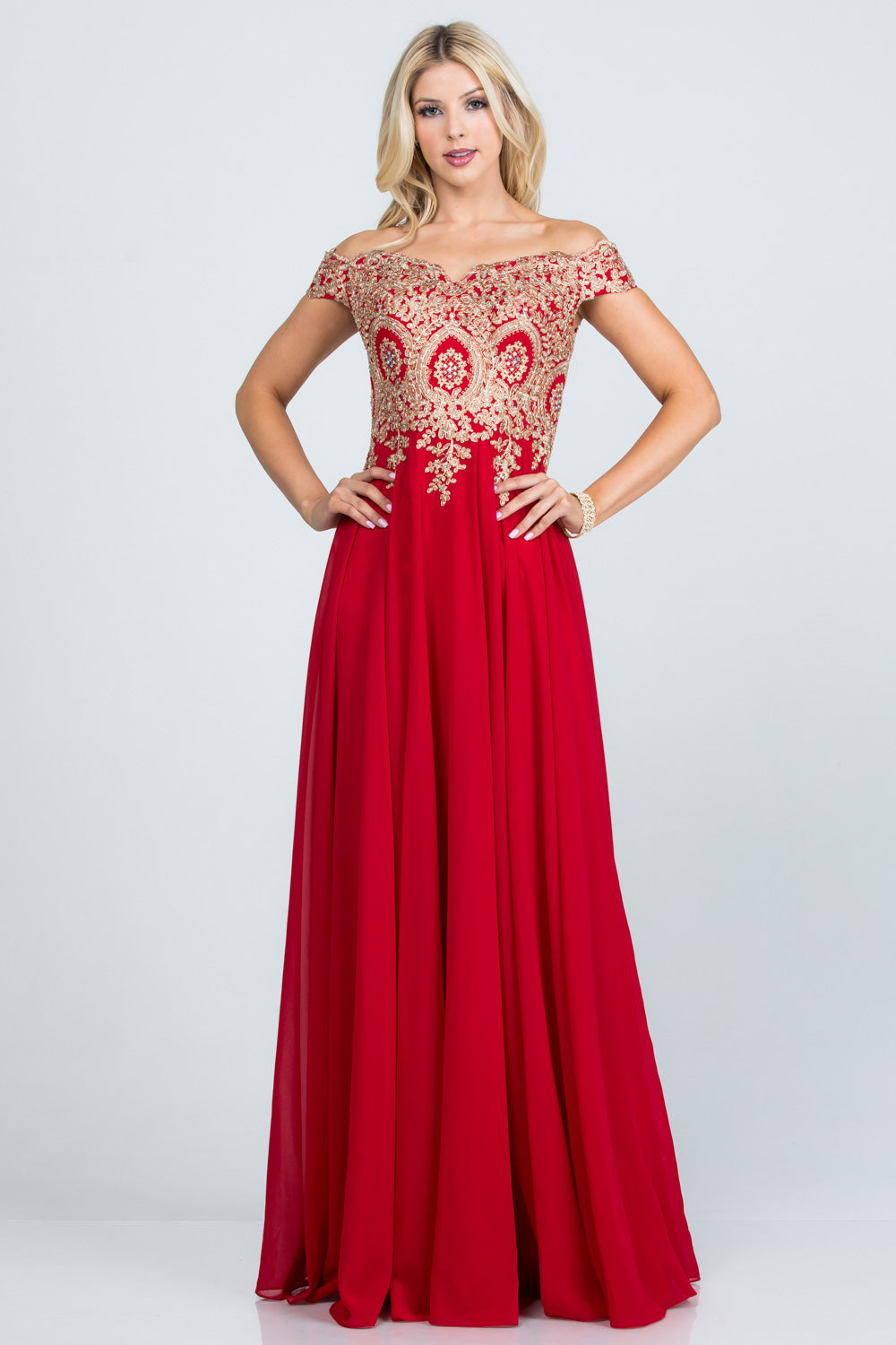 Off the shoulder chiffon gown embellished with gold lace appliques