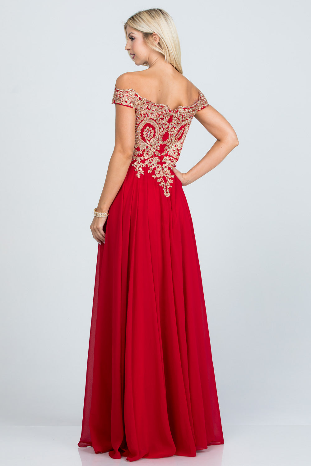 Off the shoulder chiffon gown embellished with gold lace appliques
