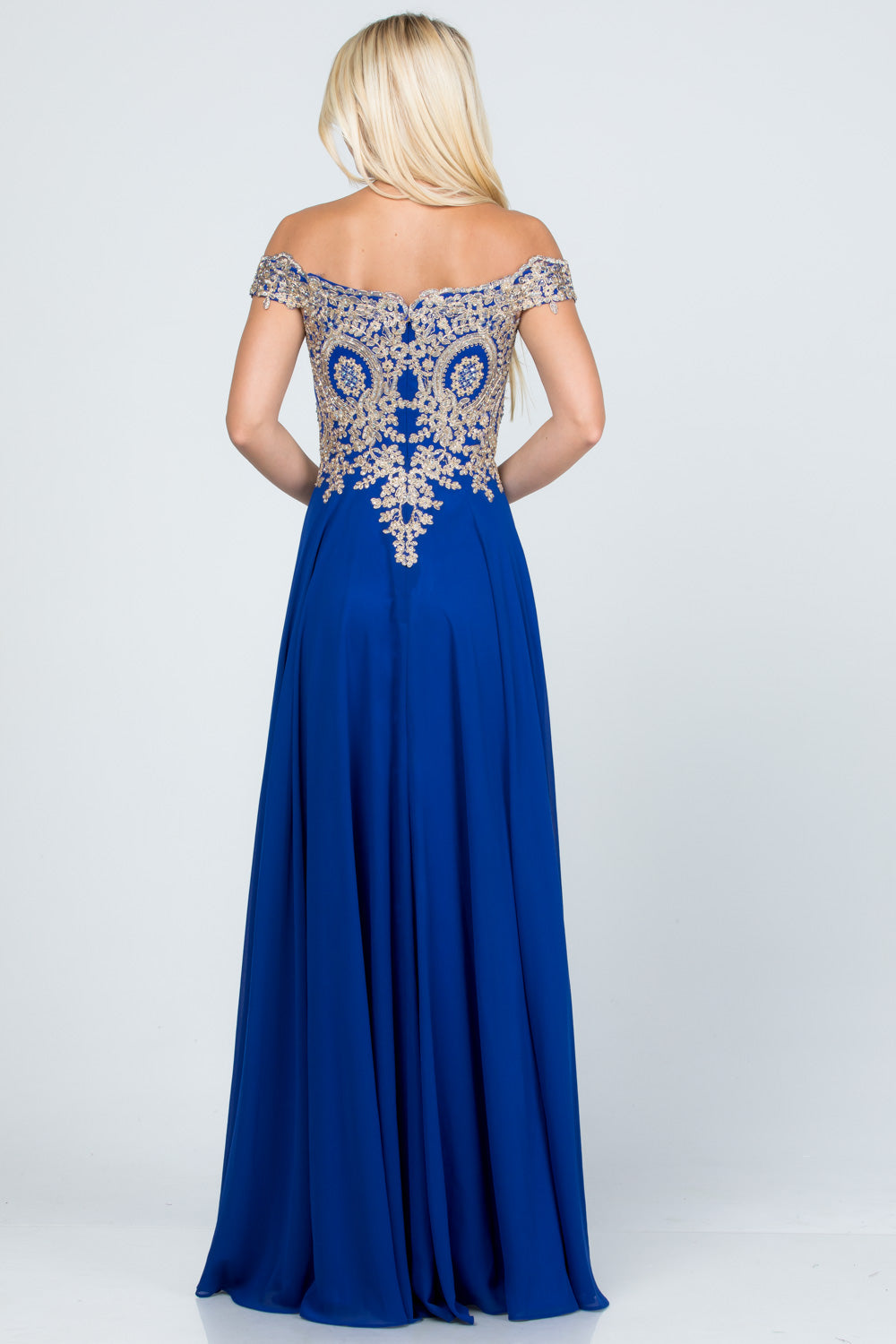 Off the shoulder chiffon gown embellished with gold lace appliques