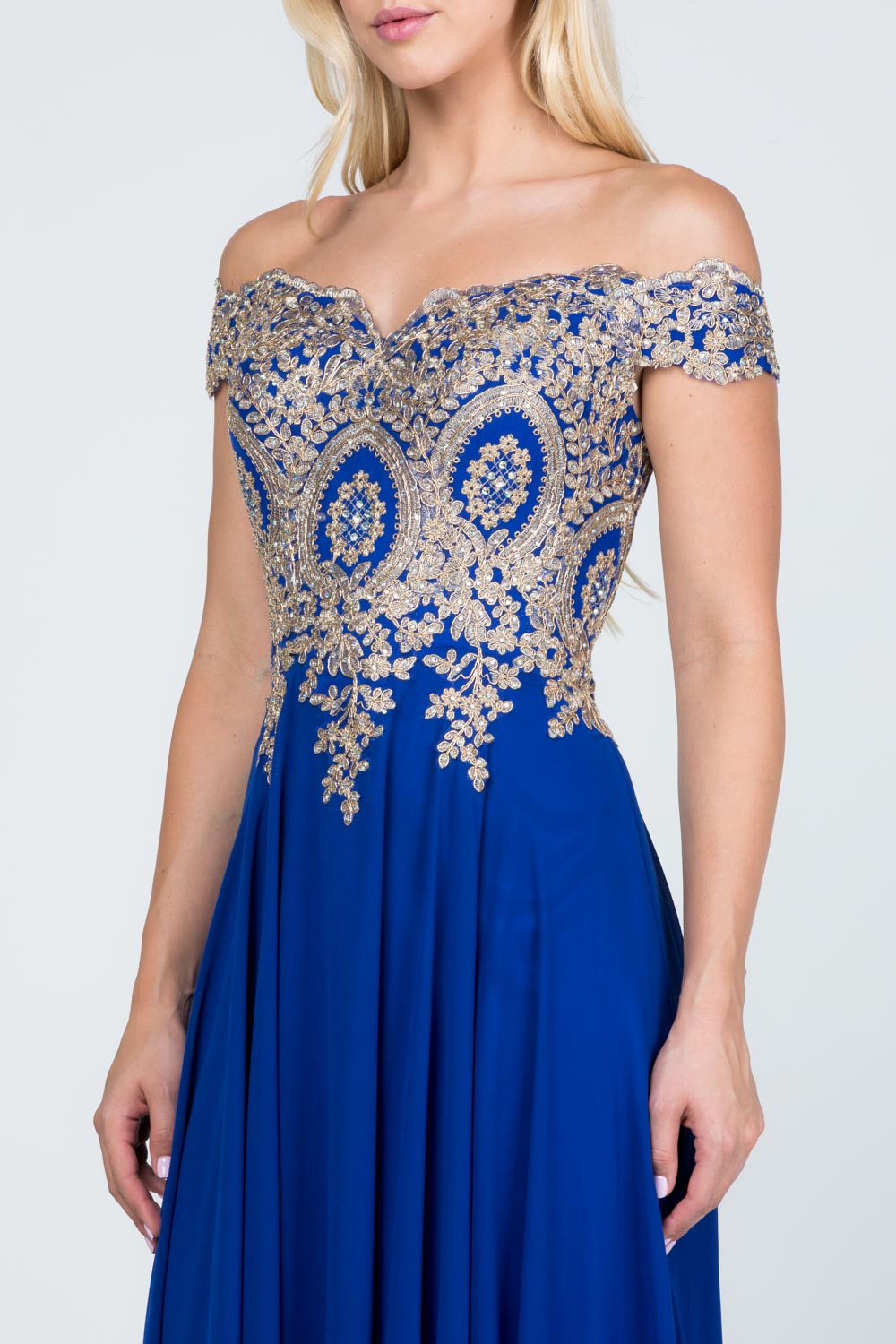 Off the shoulder chiffon gown embellished with gold lace appliques