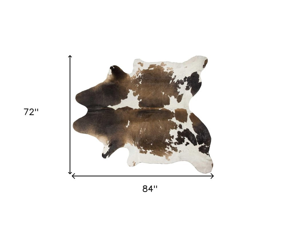6' X 7' Tan And White Cowhide Cowhide Print Area Rug