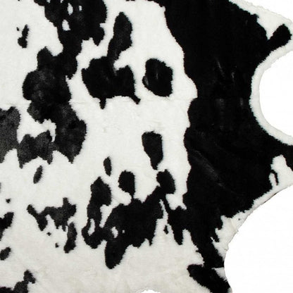 4' X 5' Black And White Faux Cowhide Animal Print Washable Area Rug