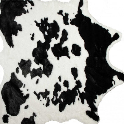 4' X 5' Black And White Faux Cowhide Animal Print Washable Area Rug