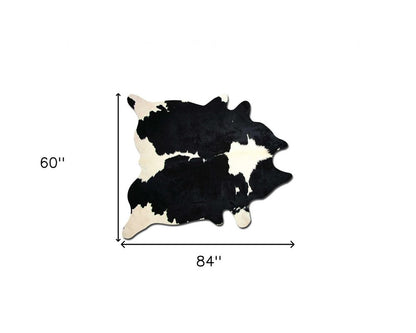 5' X 7' Black And White Cowhide Area Rug
