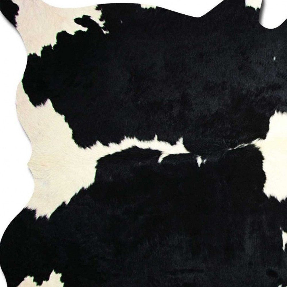 5' X 7' Black And White Cowhide Area Rug