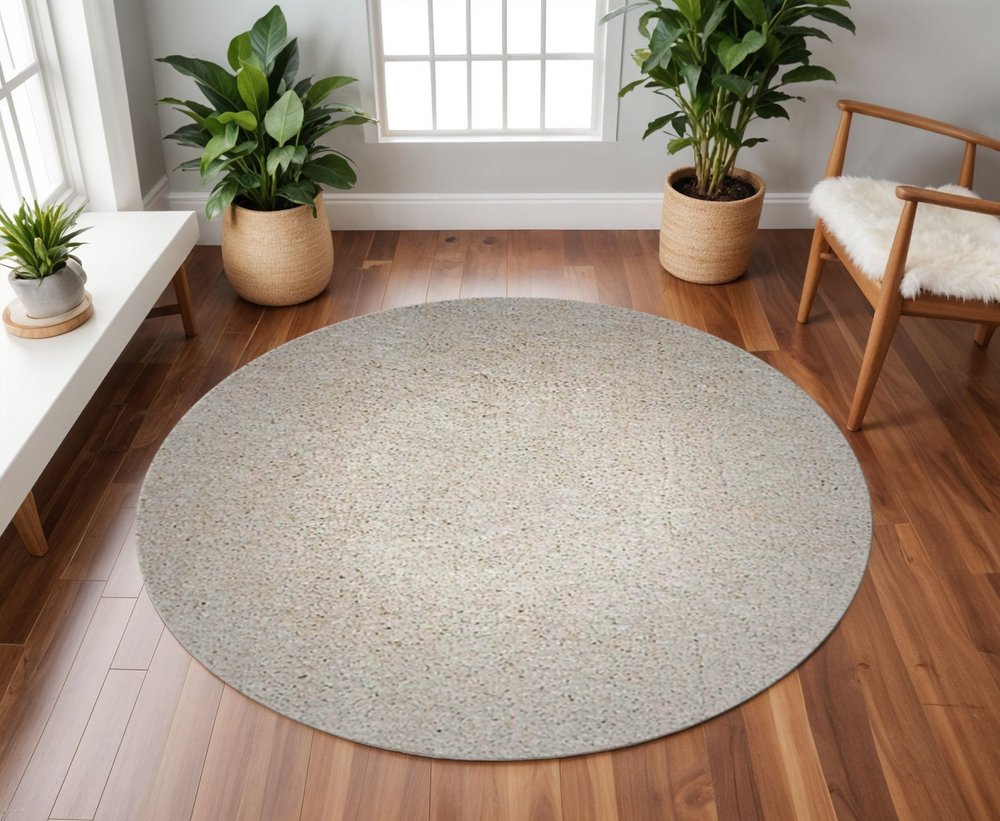 8' Ivory Hand Woven Round Rug
