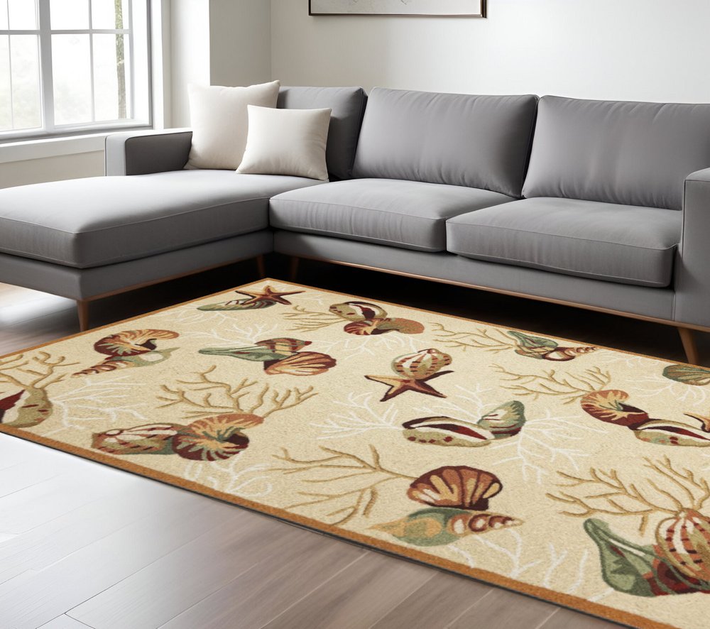 7' X 9' Beige Green And Brown Seashell and Coral Hand Tufted Area Rug