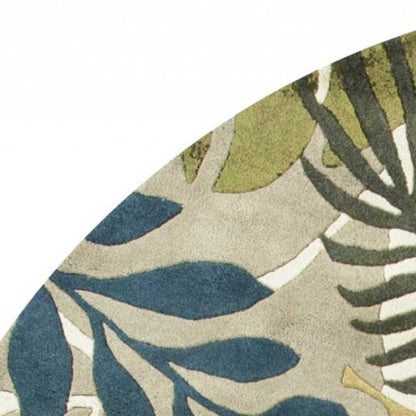 7' Ivory Green And Blue Wool Botanical Leaves Hand Tufted Round Rug