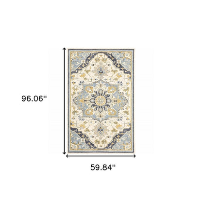 5' X 8' Blue And Ivory Bohemian Area Rug