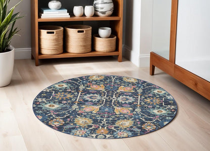 7' X 10' Navy Blue Yellow And Pink Floral Area Rug