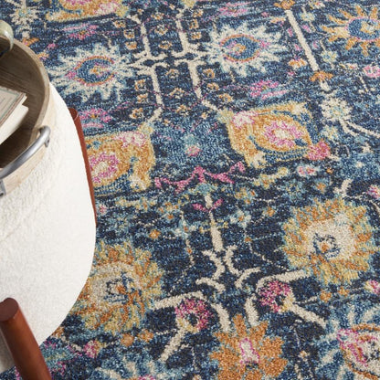 7' X 10' Navy Blue Yellow And Pink Floral Area Rug