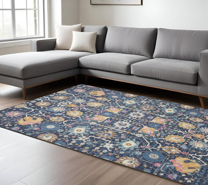 7' X 10' Navy Blue Yellow And Pink Floral Area Rug