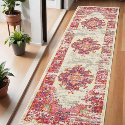 7' X 10' Ivory And Fuchsia Oriental Distressed Area Rug