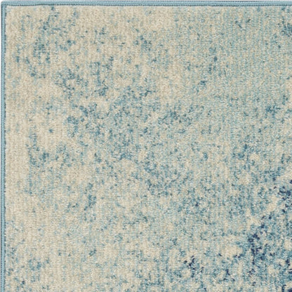 5' X 7' Blue And Ivory Abstract Area Rug
