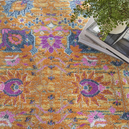 5' X 7' Blue And Orange Floral Distressed Area Rug