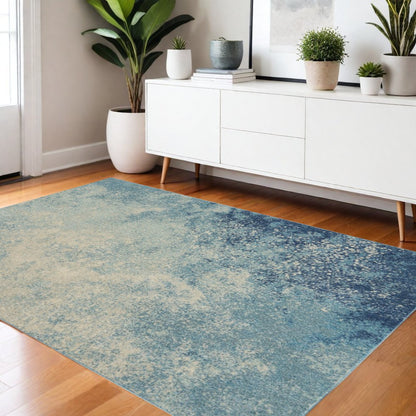 5' Blue And Ivory Abstract Round Rug