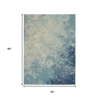 5' Blue And Ivory Abstract Round Rug