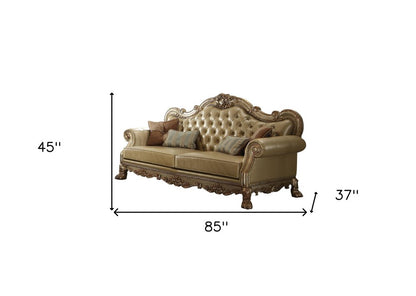 85" Bone Faux Leather Wood Sofa With Toss Pillows